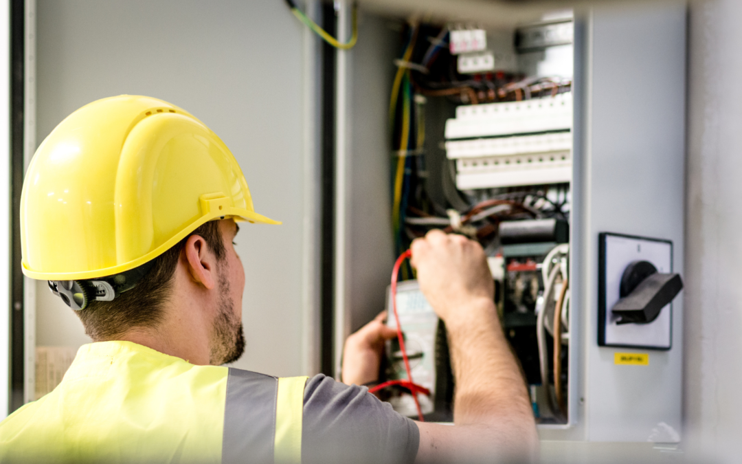 An electrician working on a modern electrical installation, symbolizing innovation in the electrical services industry