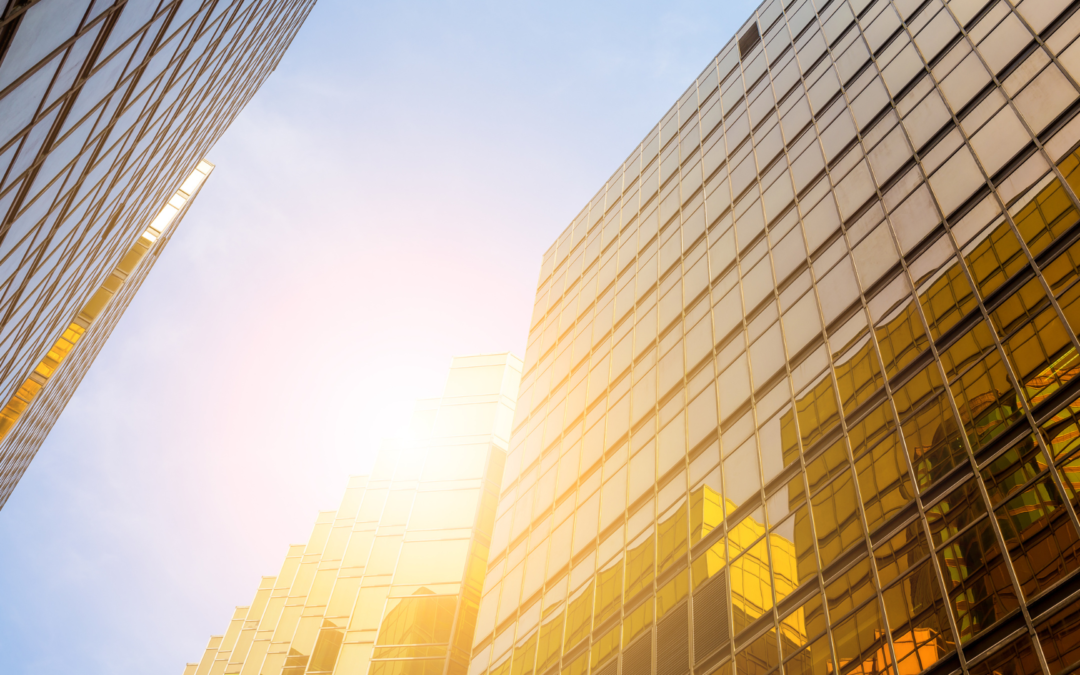 Chess pieces on a board with a business owner strategically moving the king, symbolizing planning an exit strategy for a business.