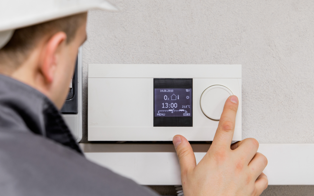 HVAC service technician representing the hot M&A market for home services companies